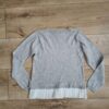 Primark - sweter z cekinami i z falbanką - 122 cm